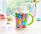 Care Bears Allover Print Ceramic Mug With Rainbow Handle | Holds 20 Ounces