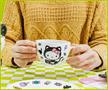 Sanrio Hello Kitty Black Cat Bone China Teacup and Saucer Set | Holds 7 Ounces
